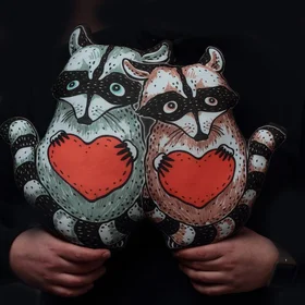 Подушка с енотами